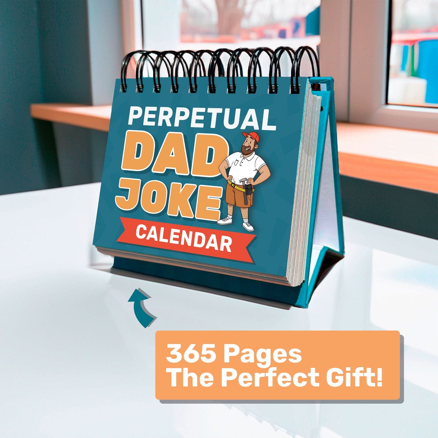 The Perpetual Dad Joke Desktop Calendar by That Is So Dad is spiral-bound and displayed on a table, featuring daily tear-off pages and a highlighted box with "365 Pages The Perfect Gift!.