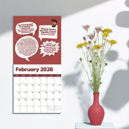 A 2026 Dad Joke Wall Calendar by That Is So Dad hangs open to February next to a white table with a red vase filled with yellow and white flowers.