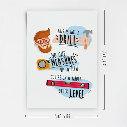 The "This Is Not A Drill" Father's Day card by That Is So Dad is a rectangular 8.3" x 5.8" cardstock print with illustrations of a man, hammer, tape measure, and level—ideal as a sentimental, construction-themed card for Dad.