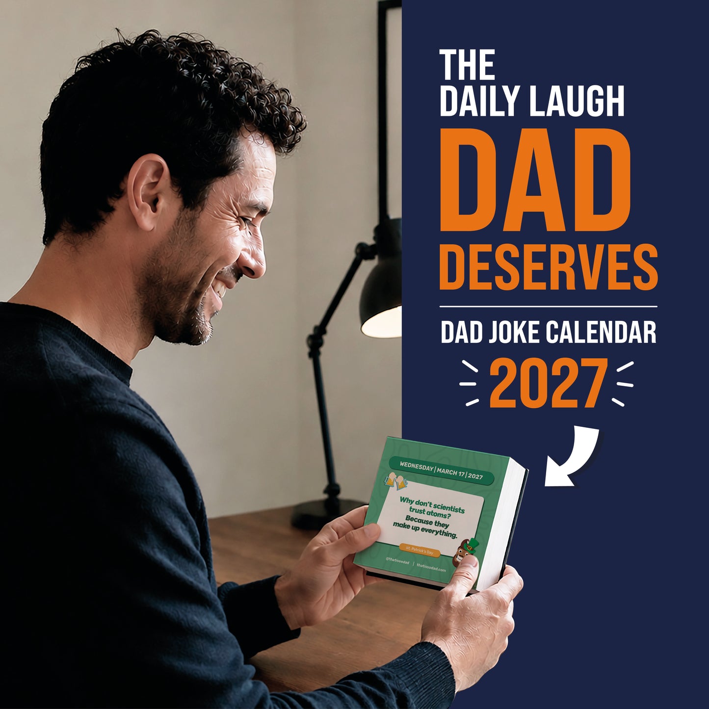 A man smiles while holding the "2027 Daily Dad Joke Desktop Calendar | Daily Dad Jokes!!" by That Is So Dad in a home office, with a lamp in the background. This 2027 calendar offers a hilarious dad joke for every day to bring laughter all year long.