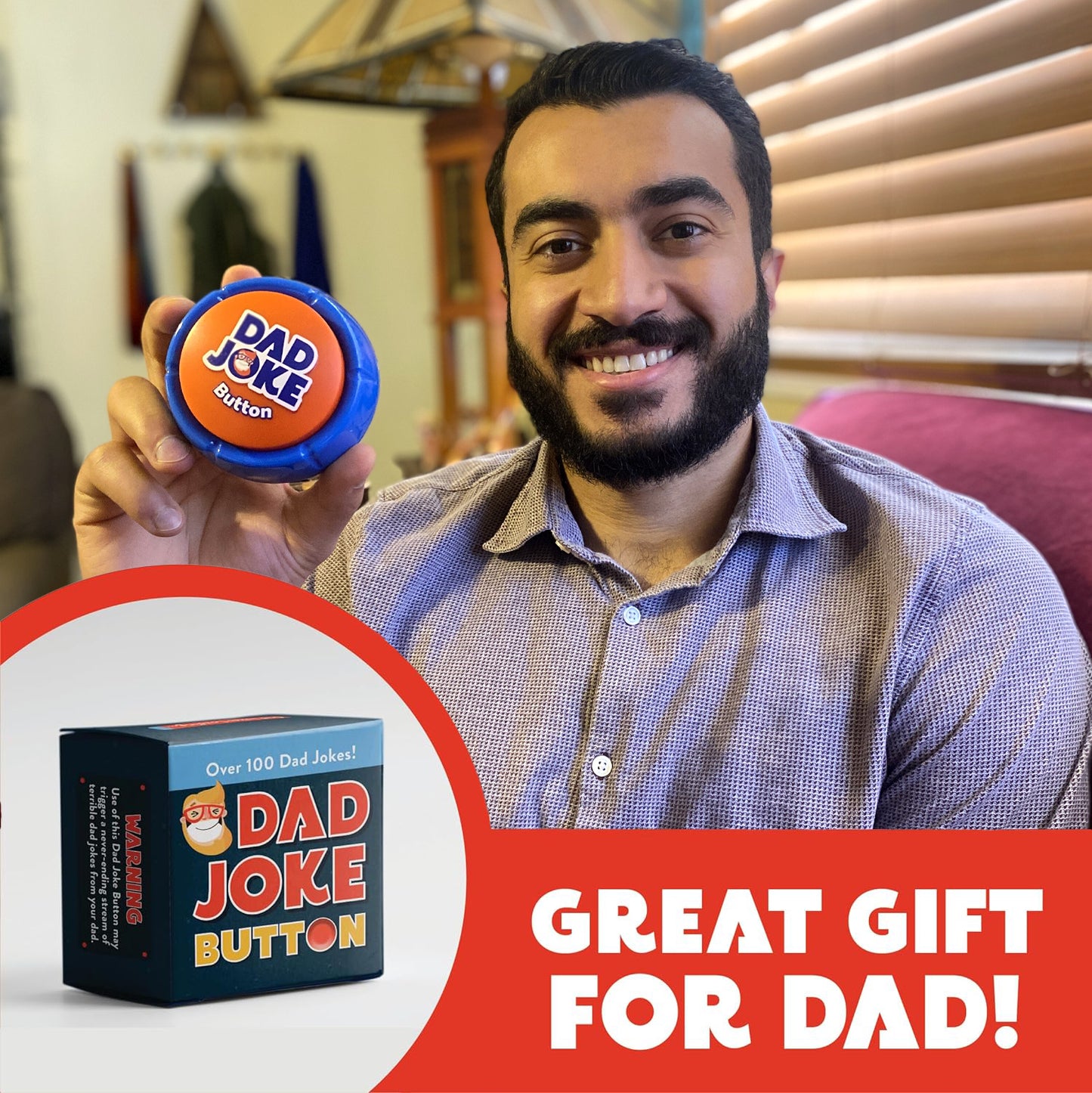 A man is smiling and holding a "Dad Joke Button" from That Is So Dad, with the box displaying the text "Great gift for dad!" visible in the foreground, promising over 100 family-friendly corny jokes.