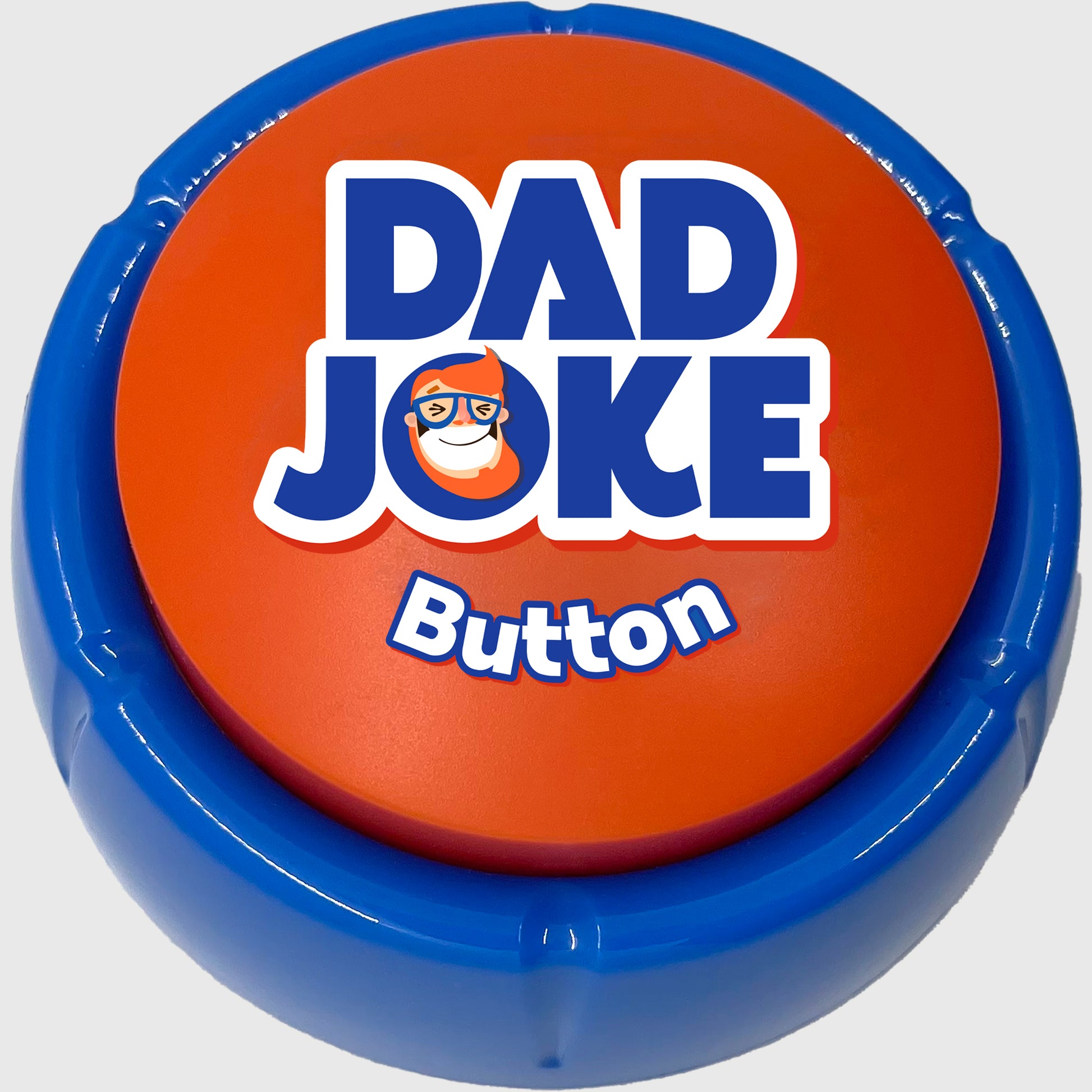 A circular button from That Is So Dad, featuring a blue base and an orange top labeled "Dad Joke Button," with a cartoon character sporting glasses and a mustache. This delightful product is perfect for delivering over 100 corny, family-friendly jokes—an ideal funny present for dad.